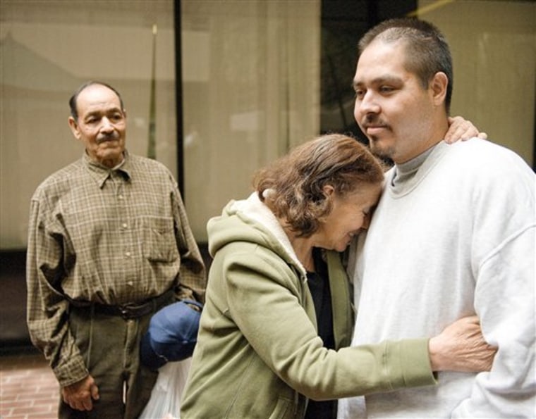 Maria Franco embraces her son Jose Antonio Franco Gonzalez, a mentally disabled man, as his father Francisco Franco looks on after his release from Immigration and Customs Enforcement detention in Santa Ana, Calif. Public-interest legal groups in California won the release of Gonzalez and another immigrant, who had been held more than four years in federal detention centers after judges put their deportation cases on hold due to questions about their mental competence. 